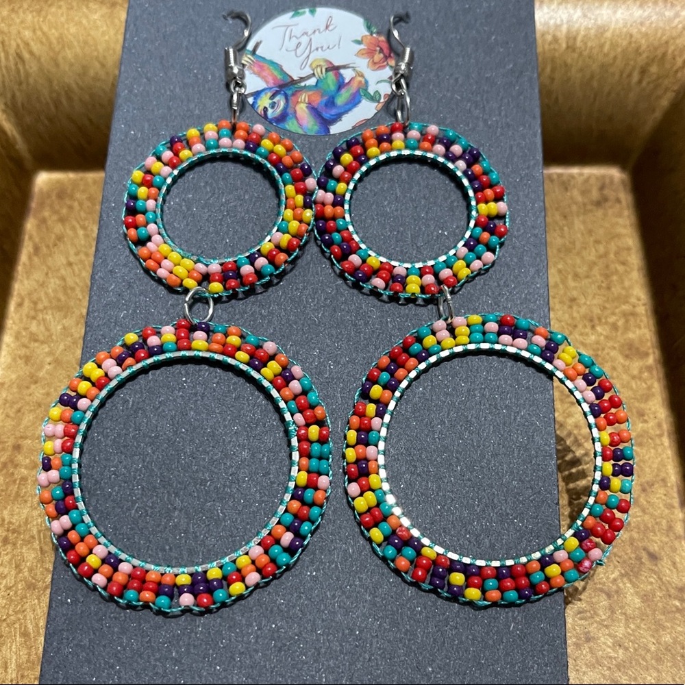 Long multi colored beaded earrings.